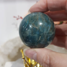 Load image into Gallery viewer, Apatite Sphere Crystal Carving on Gold Crown Stand Stone 45mm 7
