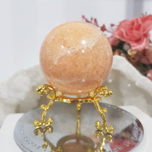 Load image into Gallery viewer, Sunstone Sphere Crystal Carving on Gold Stand Stone 50mm 1
