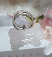 Load image into Gallery viewer, "THE LOYAL GUARDIAN" Crystal Collar Charm Dog Tag Quartz Bone Crystal Carving

FAITHFUL | PROTECTIVE | COMPANIONSHIP

&nbsp;"A dogs loyalty is one of life's greatest gifts.

The Loyal Guardian is a gentle reminder of the bond you share - always by their side through every adventure.

This charm celebrate the faithful heart that watches over yours every single day".

Chosen for the Loyal Guardian, Quartz symbolises the faithful companions that stand by us every day. Quartz is a beautiful Crystal to celebrate
