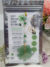 Load image into Gallery viewer, "FOUR-LEAF CLOVER BLESSINGS" Aventurine Crystal Carving Gold Stone Crystal Energy Enhancer© / Hanger / Ornament / Suncatcher

GOOD FORTUNE | HOPE | MAGIC | PROTECTION

A four-leaf clover Symbolises good luck and abundance. It is believed if you hold a four-leaf clover you will gain the ability to see fairies and leprechauns and find their treasures.&nbsp;

Beautiful Aventurine four-leaf clover crystal carving beaded with Amazonite, Aventurine and Quartz. Wire wrapped in Gold
