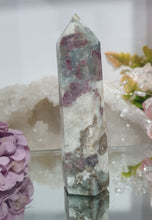 Load image into Gallery viewer, Pink Tourmaline in Quartz Crystal Point Tower Stone.

STONE OF SELF LOVE &amp; COMPASSION

Lovely Pink Tourmaline in Quartz point tower. Lovely pockets of Pink Tourmaline. 


