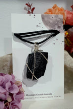 Load image into Gallery viewer, Gorgeous Black Tourmaline crystal stone wire wrapped in silver with black cord. Black Tourmaline promotes protective energy. 
