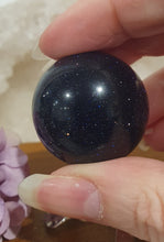 Load image into Gallery viewer, Blue Sandstone Sphere Crystal Carving on Silver Turtle Stand | Inspires Concentration and Courage

Beautiful Blue Sandstone Sphere Crystal Carving on Silver Stand in the shape of a turtle. This is so lovely and sparkly. 

