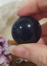 Load image into Gallery viewer, Blue Sandstone Sphere Crystal Carving on Silver Turtle Stand | Inspires Concentration and Courage

Beautiful Blue Sandstone Sphere Crystal Carving on Silver Stand in the shape of a turtle. This is so lovely and sparkly. 

