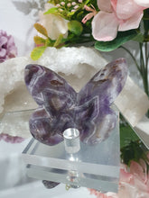 Load image into Gallery viewer, Butterfly Amethyst Crystal Carving Stone on Stand. Inspires Intuition and Spirituality.

Beautiful polished Amethyst Chevron Butterfly Crystal Carving on plastic stand
