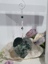 Load image into Gallery viewer, LEAF OF RENEWAL Moss Agate Leaf silver Crystal Energy Enhancer© Hanger Ornament Suncatcher, Inspires Spiritual Growth, Love &amp; Balance. Beaded with Moss Agate and Rose Quartz. Crystal Suncatchers
