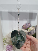 Load image into Gallery viewer, LEAF OF RENEWAL Moss Agate Leaf silver Crystal Energy Enhancer© Hanger Ornament Suncatcher, Inspires Spiritual Growth, Love &amp; Balance. Beaded with Moss Agate and Rose Quartz. Crystal Suncatchers
