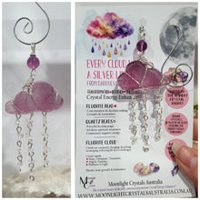 Load image into Gallery viewer, Lovely "EVERY CLOUD HAS A SILVER LINING" Fluorite Cloud silver wired Crystal Energy Enhancer© Hanger Ornament Suncatcher.

From Darkness comes Light. 

TRANSFORMATION / INTUITION / SPIRITUALITY

Beautiful Fluorite Cloud Crystal Carving beaded with Fluorite &amp; Quartz.  wired in Silver
