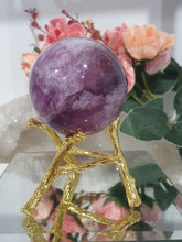 Load image into Gallery viewer, Purple Fluorite Sphere Crystal Carving Stone on Gold Branch shaped stand.
