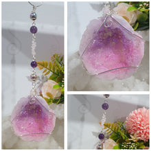 Load image into Gallery viewer, MAGICAL CRYSTAL CAVE - Handcrafted Titanium Aura Quartz Geode Crystal Energy Enhancer© / Hanger / Ornament / Suncatchers

DIVINE COMMUNICATION | HARMONY | MAGICK

Gorgeous Titanium Aura Quartz Geode crystal beaded with Rose Quartz, Amethyst and Rainbow Hematite. Wire wrapped in silver

Genuine Crystals. no plastic or glass. Ensuring energy flow throughout the enhancer.
