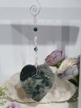 Load image into Gallery viewer, LEAF OF RENEWAL Moss Agate Leaf silver Crystal Energy Enhancer© Hanger Ornament Suncatcher, Inspires Spiritual Growth, Love &amp; Balance. Beaded with Moss Agate and Rose Quartz. Crystal Suncatchers

