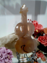 Load image into Gallery viewer, Beautiful Guitar Agate Crystal Carving Stone on Silver Stand. Promotes balance and harmony. 
