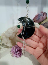 Load image into Gallery viewer, The Grounding Moon Crystal Energy Enhancer Suncatcher. Stunning Moss agate Moon beaded with Moss Agate and quartz.  Hang in your home or space and feel the ambient energy. Great Crystal gift idea. 
