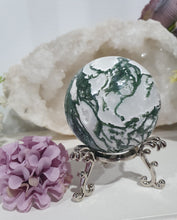 Load image into Gallery viewer, Lovely Moss Agate Sphere Crystal carving on silver stand.  Beautiful Druzy! Great Crystal Gift Idea. Promotes Grounding and connection to earth 
