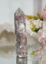 Load image into Gallery viewer, Pink Tourmaline in Quartz Crystal Point Tower Stone.

STONE OF SELF LOVE &amp; COMPASSION

Lovely Pink Tourmaline in Quartz point tower. Lovely pockets of Pink Tourmaline. 


