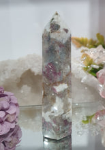 Load image into Gallery viewer, Pink Tourmaline in Quartz Crystal Point Tower Stone.

STONE OF SELF LOVE &amp; COMPASSION

Lovely Pink Tourmaline in Quartz point tower. Lovely pockets of Pink Tourmaline. 


