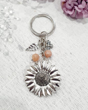 Load image into Gallery viewer, "THE SUNFLOWER KEEPER" Metal Sunflower with Sunstone Beads Crystal Keyring.

&nbsp;"The sunflower has long symbolised joy, hope and unwavering optimism. Like the flower that turns towards the sun, it reminds us to keep looking for the light, even through life's difficult seasons".

Gorgeous Metal sunflower Keyring Key ring beaded with AAA sunstone faceted beads.
