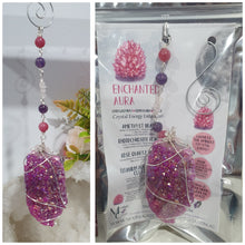 Load image into Gallery viewer, ENCHANTED AURA - Handcrafted Titanium Aura Quartz Crystal Energy Enhancer© / Hanger / Ornament / Suncatcher 

inspires EMPOWERMENT | COMPASSION | MAGICK

Gorgeous Titanium Aura Quartz crystal beaded with Rhodochrosite, Amethyst and Rose Quartz. Wire wrapped in silver

Genuine Crystals. no plastic or glass. Ensuring energy flow throughout the enhancer. Crystal Suncatchers
