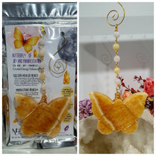 Load image into Gallery viewer, Beautiful polished Butterfly of Joy and manifestation Crystal Energy Enhancer / Sun catcher / Hanger / Ornament. Orange Calcite Butterfly Crystal Carving beaded with golden healer and moonstone.   
