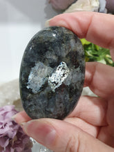 Load image into Gallery viewer, Lavakite Palm Stone Crystal Carving on Stand. Inspires Protection and Grounding
