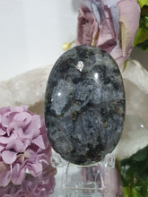 Load image into Gallery viewer, Lavakite Palm Stone Crystal Carving on Stand. Inspires Protection and Grounding
