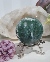 Load image into Gallery viewer, Lovely Moss Agate Sphere Crystal carving on silver stand.  Beautiful Druzy! Great Crystal Gift Idea. Promotes Grounding and connection to earth 
