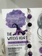 Load image into Gallery viewer, THE WITCHES HEART" Handcrafted Obsidian Heart Crystal Carving Stone Silver Crystal Energy Enhancer© Hanger Ornament Suncatcher 

INSPIRES MAGIC, INTUITION AND PROTECTION

Gorgeous Obsidian heart crystal carving stone beaded with Black Obsidian, Amethyst and Herkimer Diamonds. Wire wrapped in silver
