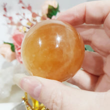 Load image into Gallery viewer, honey-calcite-sphere-crystal-carving
