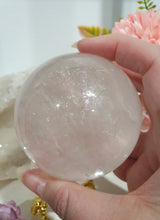 Load image into Gallery viewer, Quartz Sphere Crystal Carving Stone on Silver Stand

Inspires Magick, Purity &amp; Spirituality

Stunning Quartz Crystal Sphere Carving Stone on silver stand.  A must for any crystal collector
