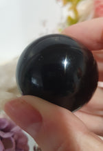 Load image into Gallery viewer, Black Obsidian Sphere Crystal Carving Stone on metal Silver Turtle Stand

Inspires Protection and balance
