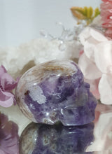 Load image into Gallery viewer, Skull Amethyst Agate Crystal Carving Stone.

INSPIRES INTUITION AND WELL BEING

Beautiful polished Amethyst Agate Skull Crystal Carving Stone. 

