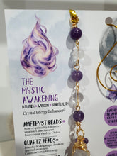 Load image into Gallery viewer, THE MYSTIC AWAKENING" Handcrafted Amethyst Raw Crystal Stone Gold Crystal Energy Enhancer© Hanger Ornament Suncatcher

INSPIRES INTUITION, WISDOM AND SPIRITUALITY

Stunning Raw Amethyst crystal stone beaded with Amethyst and Quartz. Wire wrapped in gold.
