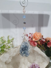 Load image into Gallery viewer, Gorgeous Blue Celestite Crystal Egg specimen Crystal Energy Enhancer / suncatcher beaded with Rose Quartz. Blue Jade and Hematite. Promote Divine Connection, harmony and spirituality. 

