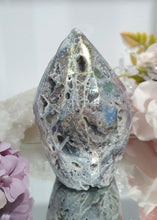Load image into Gallery viewer, Titanium Aura Sphalerite Flame Tower Druzy Crystal Cluster

PROMOTES PSYCHIC DEVELOPMENT AND UPLIFTS

Titanium Aura Sphalerite Crystal Flame Crystal Cluster.  The Druzy is lovely on the flame!. 

