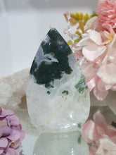 Load image into Gallery viewer, Moss Agate Flame Tower Crystal Carving Stone. Discounted because she is a tad wobbly BUT she has the most glorious Stalactite!

INSPIRES GROUNDING AND CONNECTION TO EARTH

Lovely Moss Agate Flame Crystal Carving Stone.  Wobby with a gorgeous stata
