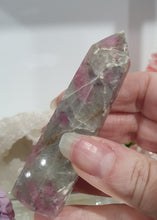 Load image into Gallery viewer, Pink Tourmaline in Quartz Crystal Point Tower Stone.

THIS POINT HAS A BROKEN TIP

STONE OF SELF LOVE &amp; COMPASSION

Lovely Pink Tourmaline in Quartz point tower. Lovely pockets of Pink Tourmaline. 
