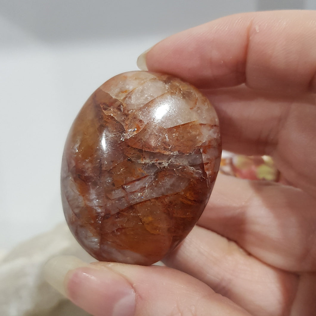 fire quartz palm stone