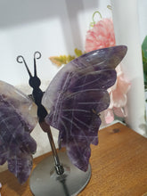 Load image into Gallery viewer, Amethyst Butterfly Wings Crystal Carving Stone on Stand.

Inspires Intuition and Spirituality

Beautiful Amethyst Stone Butterfly Wings Crystal Carving on stand.  These have amazing inclusions in them.     
