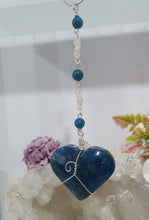 Load image into Gallery viewer, HEART OF POSSIBILITY" Handcrafted Apatite Heart Crystal Carving Silver Crystal Energy Enhancer© / Hanger / Ornament / Suncatcher 

MANIFEST | LOVE | HARMONY

Gorgeous Apatite heart crystal carving beaded with Apatite, Rose Quartz &amp; Quartz.  Wire wrapped in silver
 

