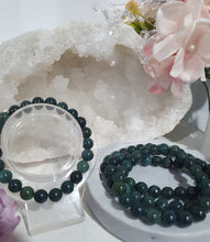 Load image into Gallery viewer, Forest Floor" Moss Agate Beaded Bracelet Crystal Gemstone Stone

7.5inch with 8mm beads. 

INSPIRES GROUNDING AND TRANSFORMATION 

Lovely Moss Agate Gemstone Beaded Bracelet.  Intuitively (Ramdomly) chosen.
