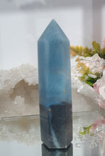 Load image into Gallery viewer, Trolleite Crystal Point Tower Stone.  

THIS HAS A BROKEN TIP

INSPIRES MANIFESTATION AND SPIRITUAL GUIDANCE

Lovely Trolleite point tower.  Has a broken tip



