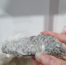 Load image into Gallery viewer, Apophyllite Crystal Cluster Specimen Stone on plastic Stand 

Promotes Divine Guidance

Lovely Apophyllite crystal cluster on plastic stand. Has tiny crystals poking out of it.  The photos just don't pick up the lovely sparkles. 
