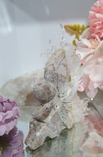 Load image into Gallery viewer, Fairy Quartz Cluster Crystal Carving Stone . Discounted as she is slightly bent 

Inspires Magick, Purity &amp; Spirituality

Stunning Quartz Crystal cluster fairy with gorgeous quartz crystal teeth. She is discounted as slightly bent at top
