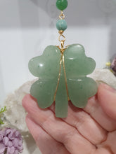 Load image into Gallery viewer, "FOUR-LEAF CLOVER BLESSINGS" Aventurine Crystal Carving Gold Stone Crystal Energy Enhancer© / Hanger / Ornament / Suncatcher

GOOD FORTUNE | HOPE | MAGIC | PROTECTION

A four-leaf clover Symbolises good luck and abundance. It is believed if you hold a four-leaf clover you will gain the ability to see fairies and leprechauns and find their treasures.&nbsp;

Beautiful Aventurine four-leaf clover crystal carving beaded with Amazonite, Aventurine and Quartz. Wire wrapped in Gold
