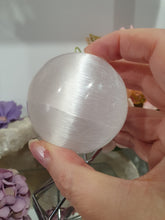 Load image into Gallery viewer, Selenite Sphere Crystal Carving on Silver Stand.| Inspires Connection to the Angelic Realm
