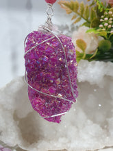 Load image into Gallery viewer, ENCHANTED AURA - Handcrafted Titanium Aura Quartz Crystal Energy Enhancer© / Hanger / Ornament / Suncatcher 

inspires EMPOWERMENT | COMPASSION | MAGICK

Gorgeous Titanium Aura Quartz crystal beaded with Rhodochrosite, Amethyst and Rose Quartz. Wire wrapped in silver

Genuine Crystals. no plastic or glass. Ensuring energy flow throughout the enhancer. Crystal Suncatchers
