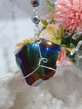 Load image into Gallery viewer, COSMIC ARMOUR - Handcrafted Rainbow Obsidian Stone Crystal Energy Enhancer© / Hanger / Ornament / Suncatcher 

INSPIRES PROTECTION AND GROUNDING

Gorgeous Rainbow Obsidian raw crystal stone beaded with Rainbow Hematite and Hematite. Wire wrapped in silver
