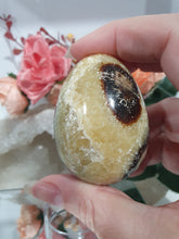 Load image into Gallery viewer, Beautiful polished Septarian Egg Crystal Carving Stone on plastic stand. A must for any crystal collector 
