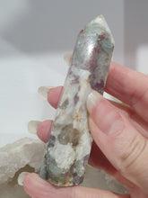 Load image into Gallery viewer, Pink Tourmaline in Quartz Crystal Point Tower Stone.

STONE OF SELF LOVE &amp; COMPASSION

Lovely Pink Tourmaline in Quartz point tower. Lovely pockets of Pink Tourmaline. 


