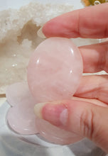 Load image into Gallery viewer, Worry Stone" Rose Quartz Crystal Carving Stone.

INSPIRES UNCONDITIONAL LOVE &amp; HARMONY

What is a worry Stone? Perfectly shaped for your thumb, this crystal worry stone connects you to positive energy. Rubbing its smooth surface allows it to act as a powerful vessel for emotional release from anxiety and stress.

Lovely Rose Quartz crystal worry stone crystal carving.  Pop in your bag and keep with you to alleviate stress. Intuitively ( Randomly) chosen.


